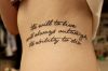 text tattoo on ribs